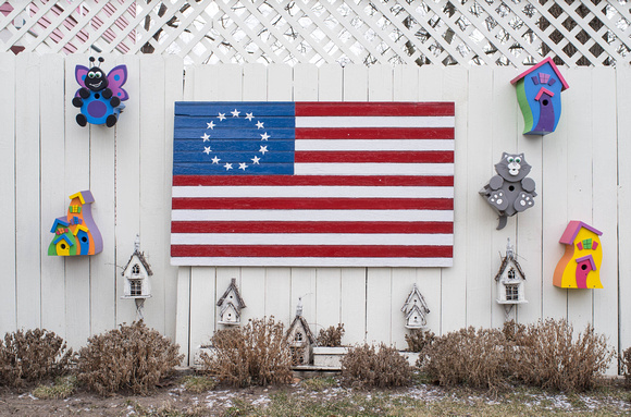 Flag on fence, Iowa City, iA, 2013